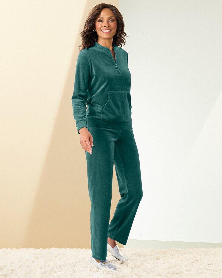 Tracksuit trousers for men and women in asparagus green cotton blend.